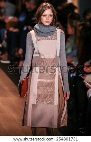 NEW YORK - FEBRUARY 12: A model walks the runway at the BCBGMAXAZRIA Fall/Winter 2015 collection during Mercedes-Benz Fashion Week in New York on February 12, 2015.