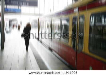 Stressed female taking the S-train - Berlin, Germany. Motion blur.