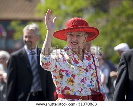 NYBORG, DENMARK - JUNE 2 :  H M Queen Margrethe the 2nd of Denmark waves to the crowds during her official visit  June 2, 2009 in Nyborg.