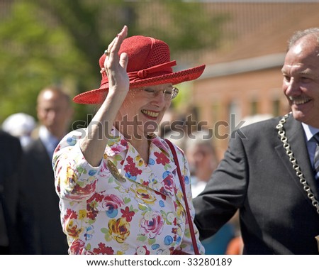 NYBORG, DENMARK - JUNE 2: H M Queen Margrethe the 2nd of Denmark during her official visit to Nyborg,  Denmark on the 2nd of June 2009. Accompanied by lord mayor Joern Terndrup.