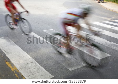 Professional cyclists rushing by just before the finishing line in a great Danish race.