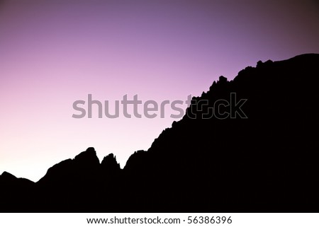 Peaks of the Dolomites in sunset seen from the mountain pass Pordoi - Italy. Or is a graph from a business with success?