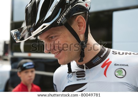 NYBORG, DK - JUNE 26: Rider Mads Christensen in front of the team bus before the start of the 219 km  National Road Racing Championship on June 26, 2011 in Nyborg, Denmark.