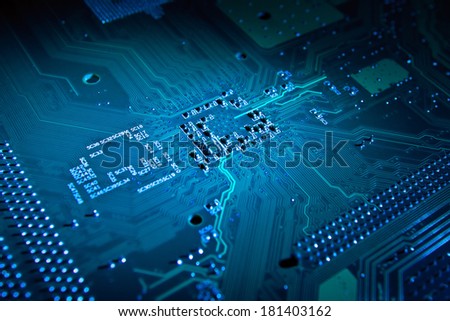 Computer motherboard artistic abstract background in blue color