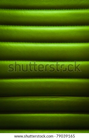 green leather seats are welded to horizontal suture