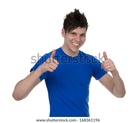 A half length portrait of a young man using a thumbs up gesture, isolated on white