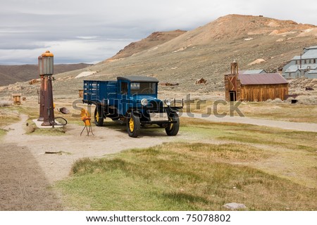 BODIE, CA - MAY 31: An old pick-up truck sits next to a gas station in Bodie, California on May 31, 2010. Bodie is a ghost town that receives about 200,000 visitors yearly.