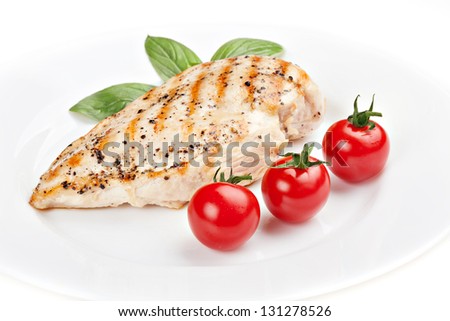 Grilled chicken breast with fresh cherry tomatoes
