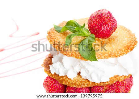 Sesame pastry with whipped cream and strawberries