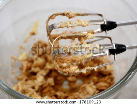 Food mixer beaters used to cream butter and sugar together