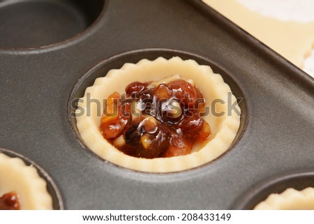 Close up of traditional mincemeat in pastry shell to make a mince pie