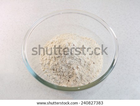 Malted bread flour mix with mixed seeds in a glass bowl