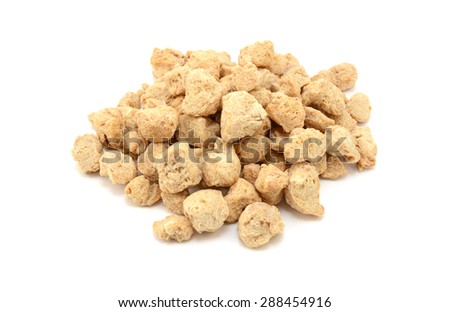 Soya protein chunks used in vegetarian and vegan food, isolated on a white background