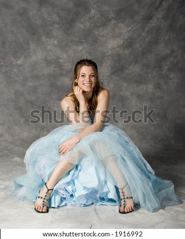teen girl wearing prom dress