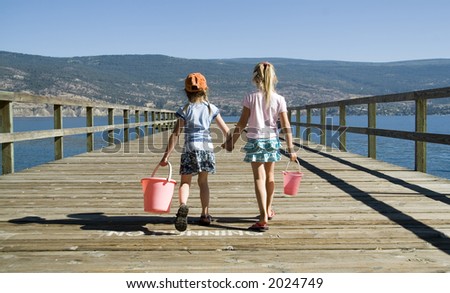 stock photo : kids walking holding hands