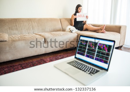 Young handsome caucasian woman working in home based office