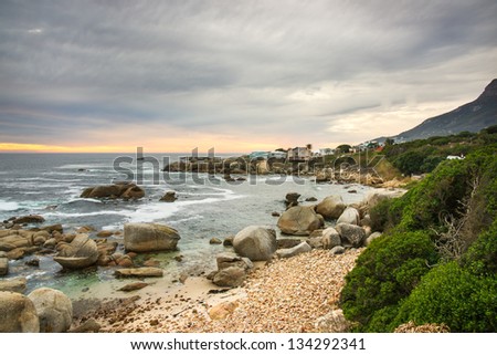 Beautiful rocky seascape in Cape town city shot during sundown