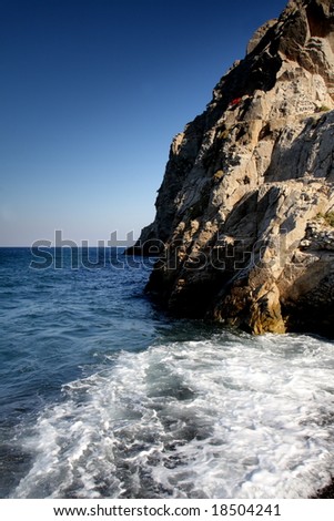 Cliffs and blue see at Greek shores