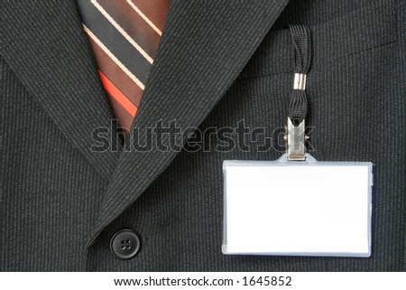 suit and name tag