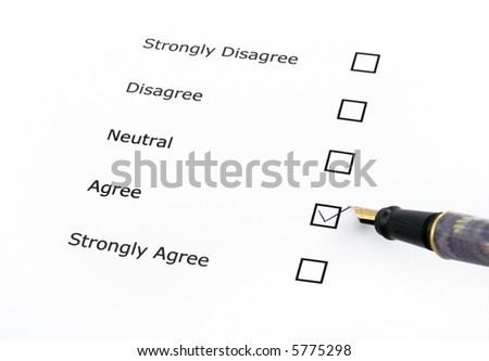 questionnaire with the agree option ticked and a pen