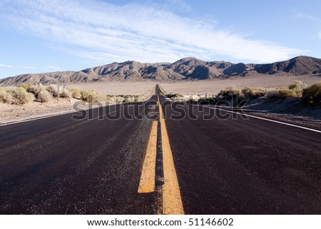 Long strecth of empty desert highway