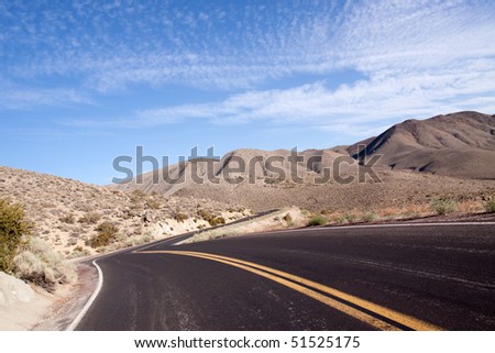 Long stretch of winding desert highway