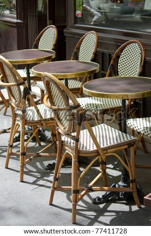 Parisian restaurant terrace during a sunny day in spring