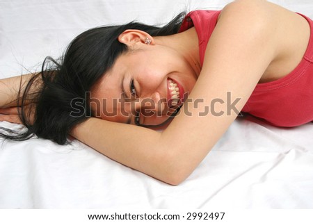 Asian woman on the bed.