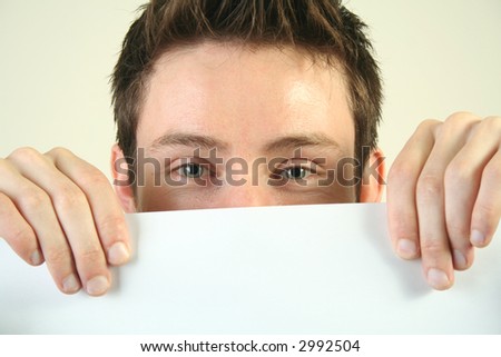 Man holding the white board.