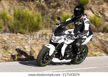 BEMBIBRE, SPAIN - JUNE 23: Motorcyclist unidentified with Kawasaki Z750 in the 3rd motorcycle rally \
