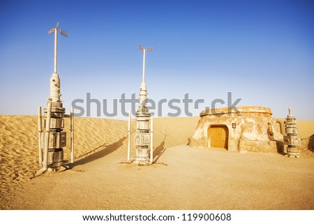 SAHARA, TUNISIA - JUL 10: Abandoned sets for the shooting of the movie Star Wars in the Sahara desert on a background of sand dunes on July 10, 2012 in Sahara, Tunisia