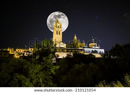 Full moon and starry night view of the cathedral of Segovia, Castilla y Leon, Spain