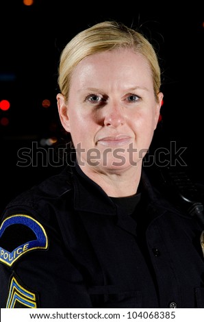 a female police officer in the night during her shift.