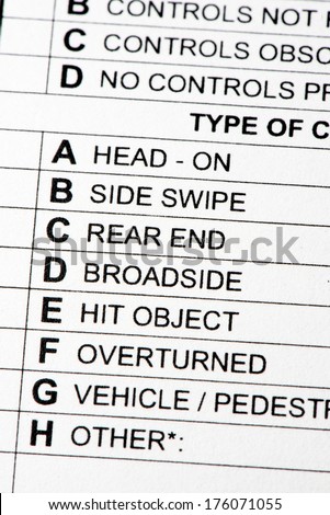 A close up view of a traffic collision report form.