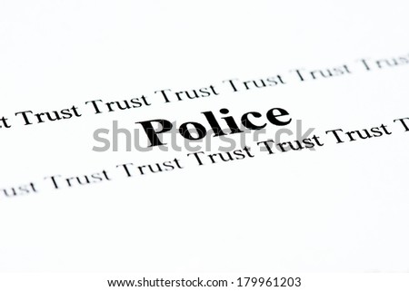 The words Police and Trust printed on a page.