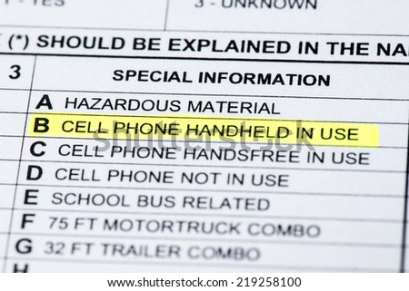 A close up the cell phone section on  a police collision report.