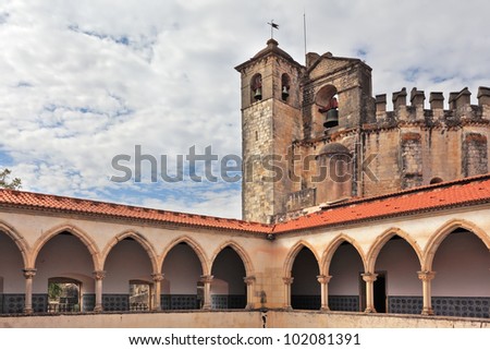 The imposing medieval castle of the Knights Templar. and the bell tower. Courtyard, patio, surrounded by a gallery