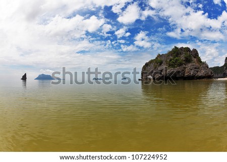 Coastal waters of the Thai gulf. Morning after a storm. Set of picturesque small islands