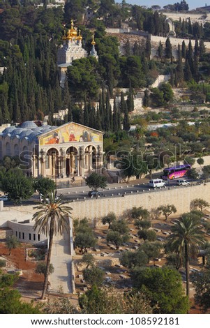Mount of Olives in Jerusalem. All Saints Church, the road and centuries-old cypress trees
