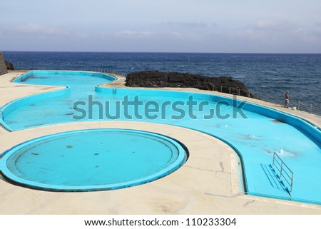 Picturesque, the freakish form swimming pool at coast of Atlantic ocean on island Madiera