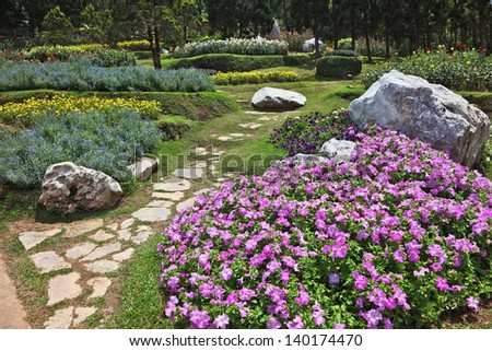 The most beautiful park in South-East Asia in Thailand. Gorgeous flower beds, lawns and sidewalks, paved with stones