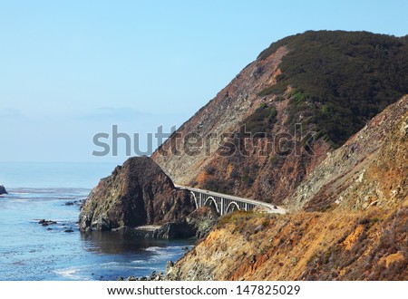 Majestic viaduct on the picturesque shore of the Pacific Ocean