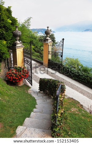 Luxurious historic villa on Lake Como. The gate to the park