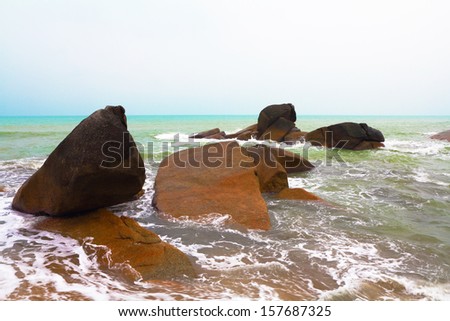 After the storm. The beach and the picturesque cliffs of Koh Samui, after the flood and storm