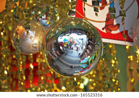Mirror balls and gold tinsel decorated the hall a luxury hotel. Christmas is coming!