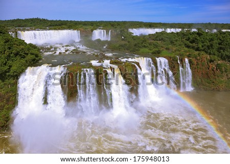 The best-known falls in the world - Iguazu. The magnificent rainbow costs over roaring water streams.