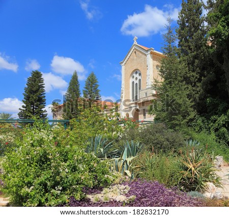 The magnificent building of the temple is surrounded by a lush garden. The famous Trappist monastery - Latrun
