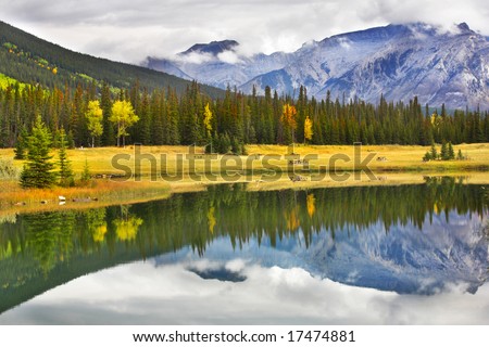 The mountain and a wood are reflected in a smooth surface of lake. More magnificent pictures from the American and Canadian National parks you can look hundreds in my portfolio. Welcome!