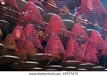 Cones  incense burners, hooked to a ceiling of a Chinese temple