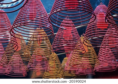 Cones  incense burners, hooked from a ceiling of a Chinese temple